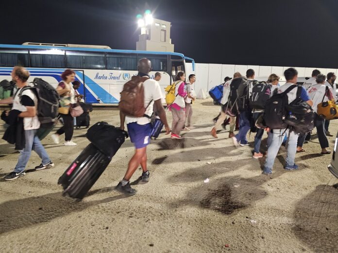 Rafah border crossing between Gaza and Egypt opens to allow limited evacuations